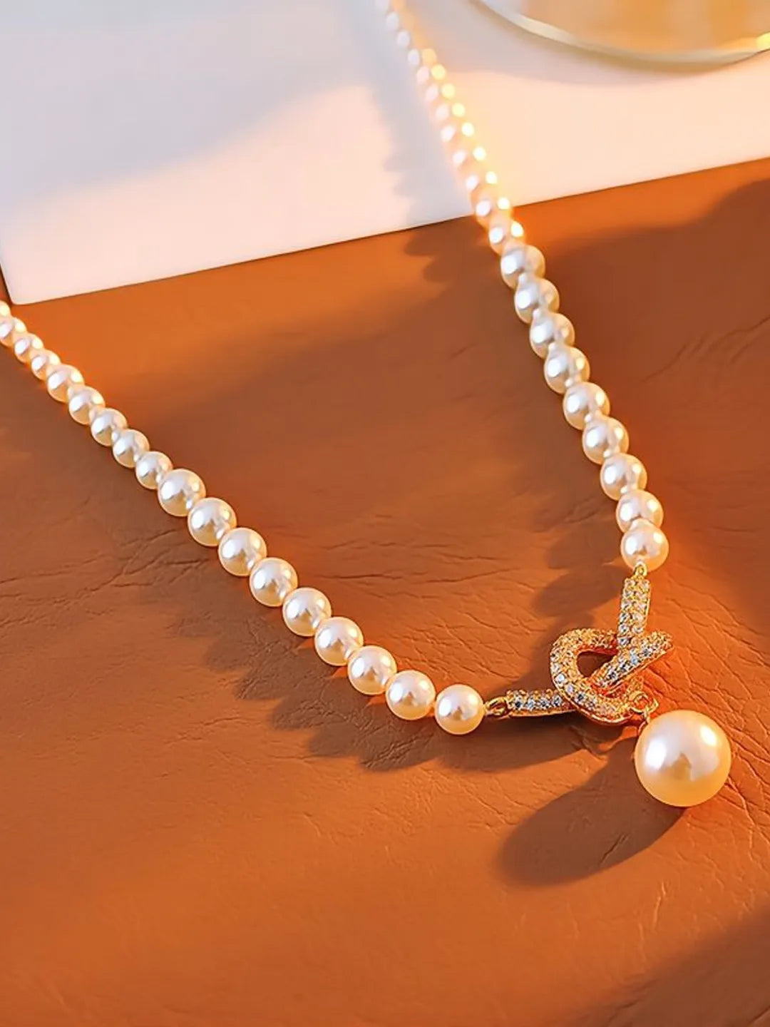 TIED PEARL NECKLAC